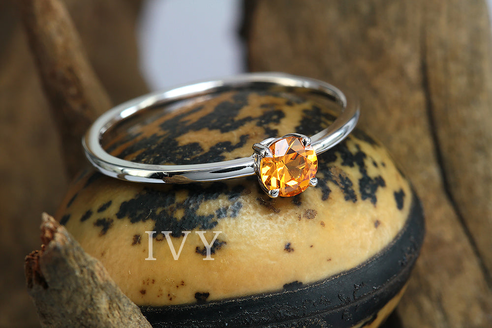  Ring with Mandarin Garnet